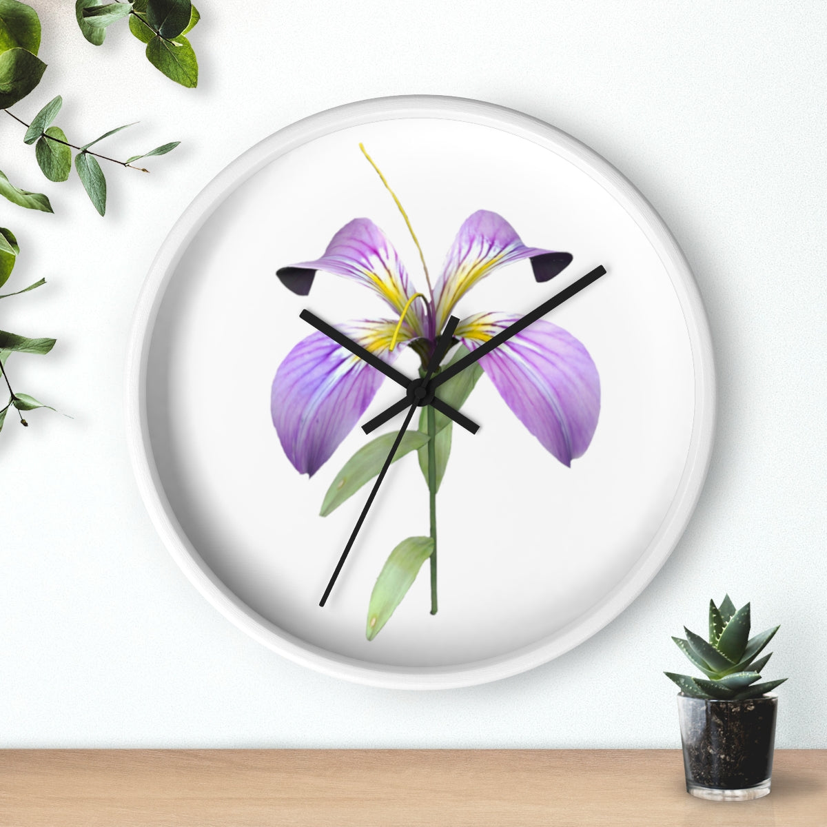 A stylish Purple Flower Wall Clock featuring a wooden frame and plexiglass face, showcasing a vibrant floral design.