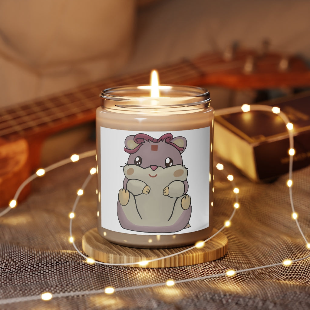 Purple Hamster Scented Candle in a glass container, featuring a permanent adhesive label, showcasing its soothing aroma and eco-friendly materials.