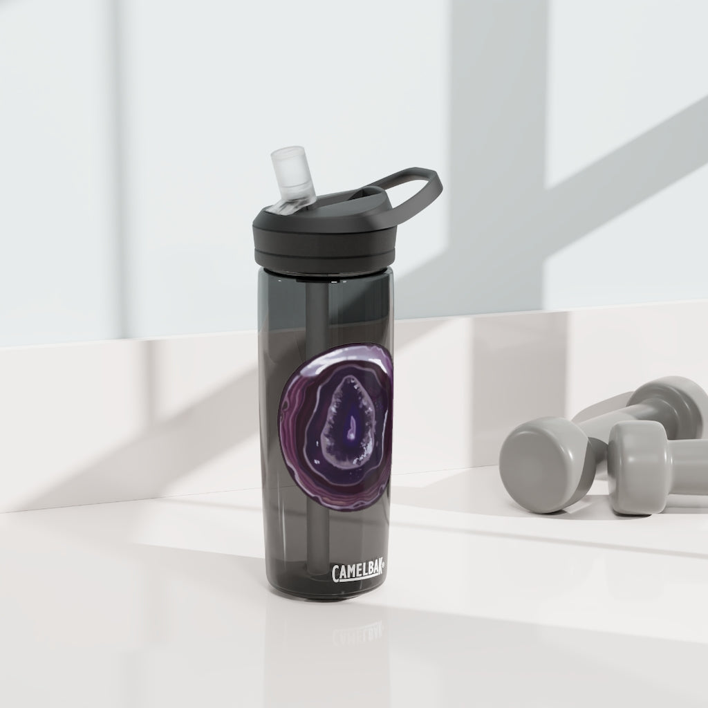 Purple Rock CamelBak Eddy® Water Bottle in 20oz and 25oz sizes, showcasing its durable design and spill-proof valve.