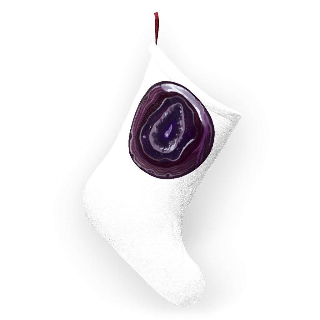 Purple Rock Christmas Stockings hanging by a fireplace, featuring custom prints and a twill ribbon loop.