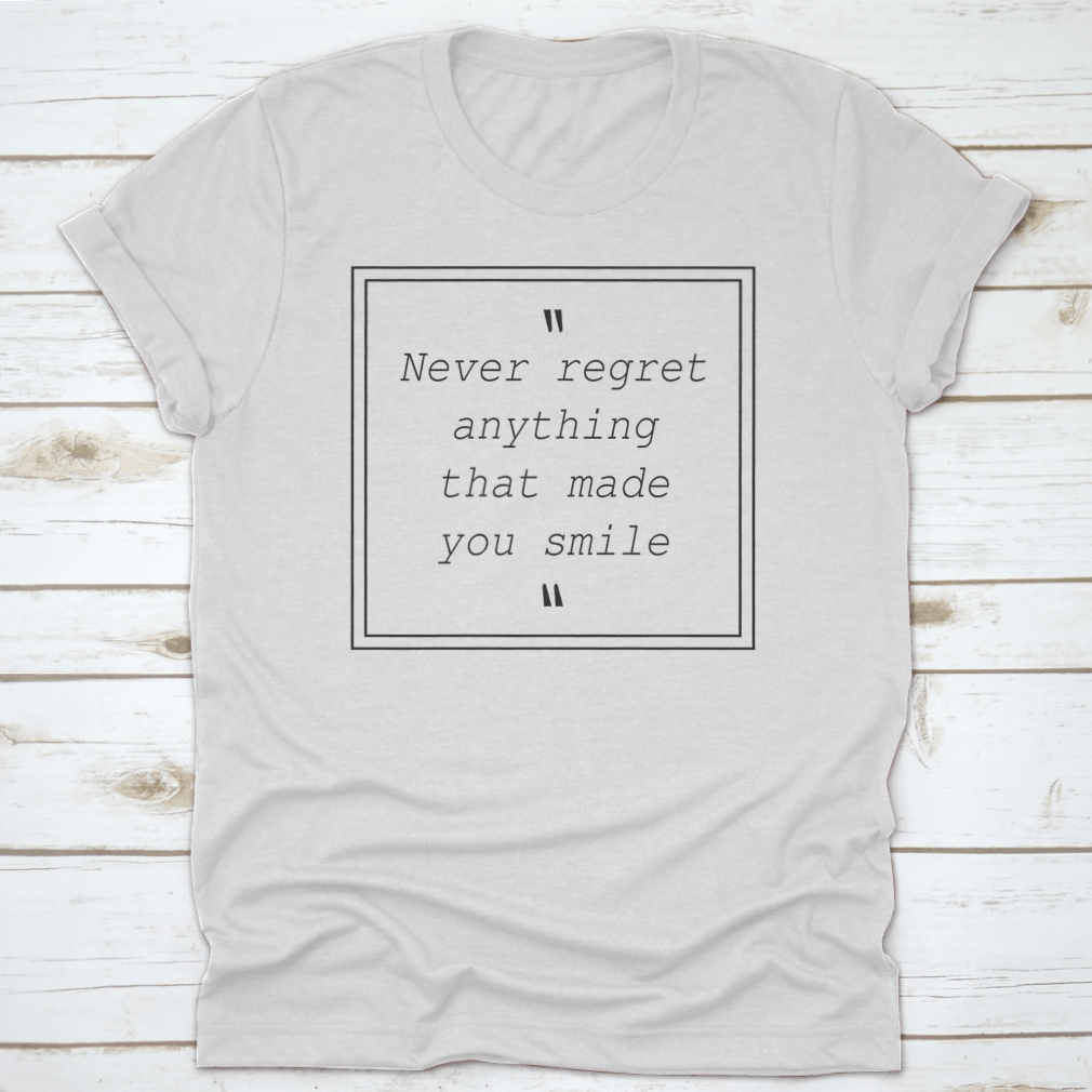 A comfortable t-shirt featuring the quote 'Never Regret Anything That Made You Smile', made from 100% cotton with a classic fit.