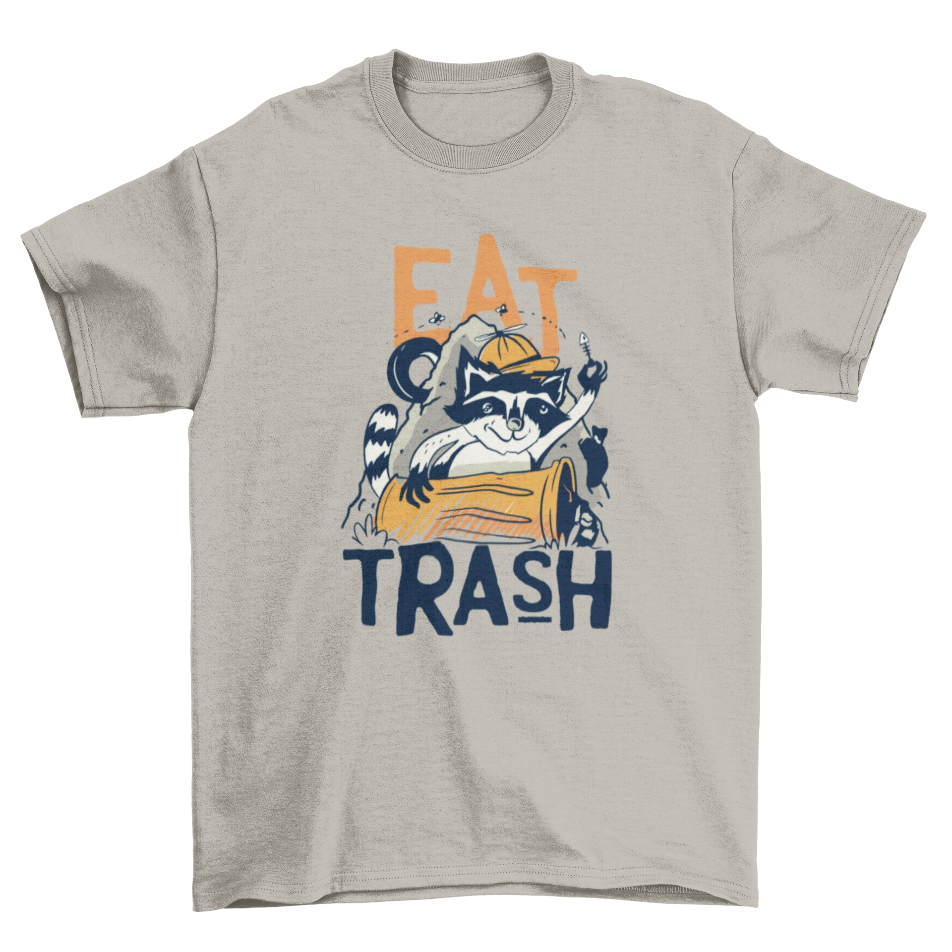 A humorous t-shirt featuring a raccoon surrounded by trash with the text 'EAT TRASH' printed on it.