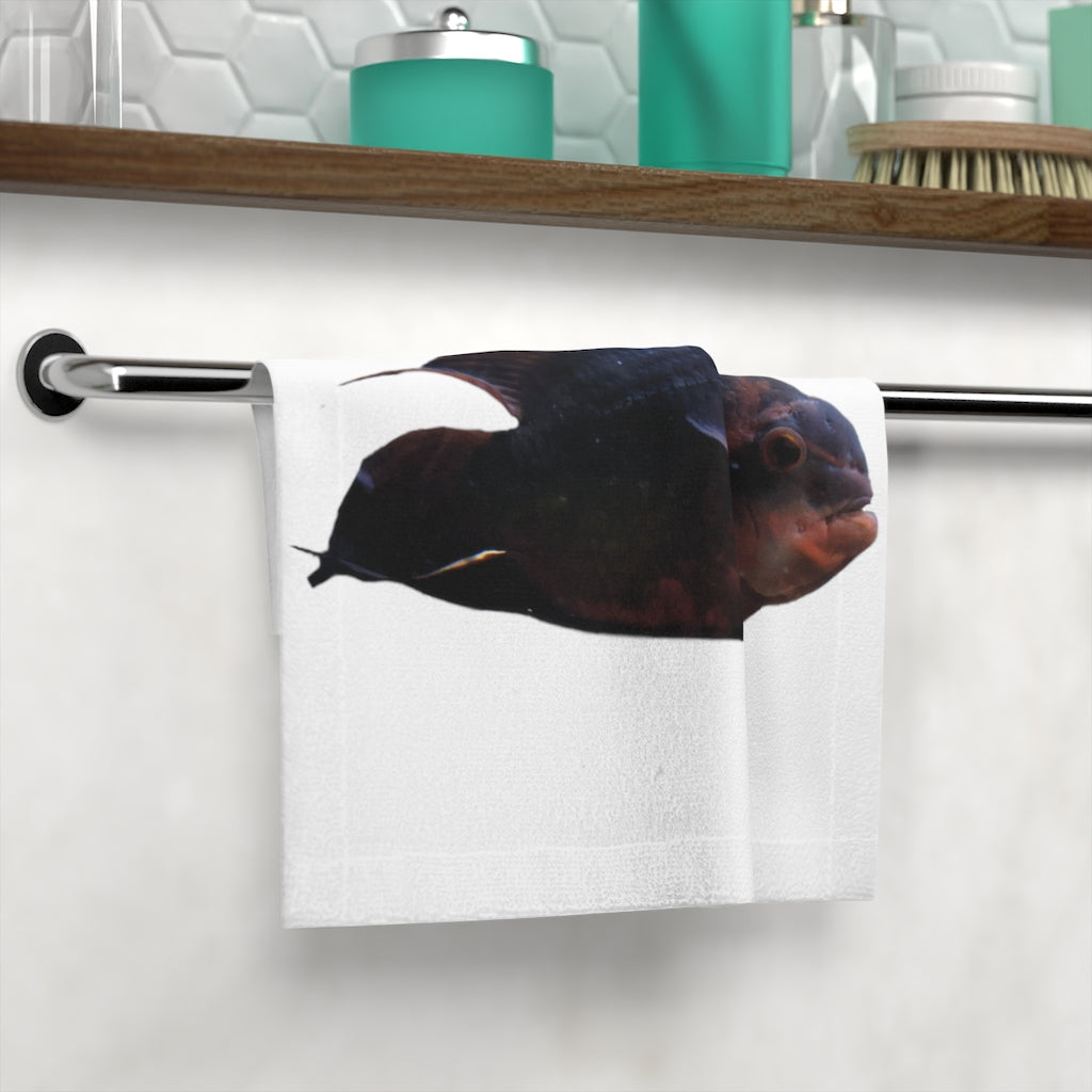 Red and black fish face towel featuring a vibrant design on a soft polyester front and absorbent cotton back.