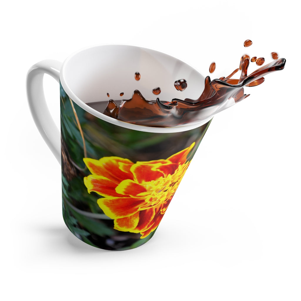 A vibrant red and yellow flower latte mug with a C-handle, showcasing a beautiful floral design on durable ceramic.