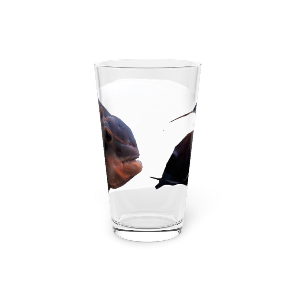 A clear 16oz pint glass featuring a red and black fish design, perfect for personalized beverages.