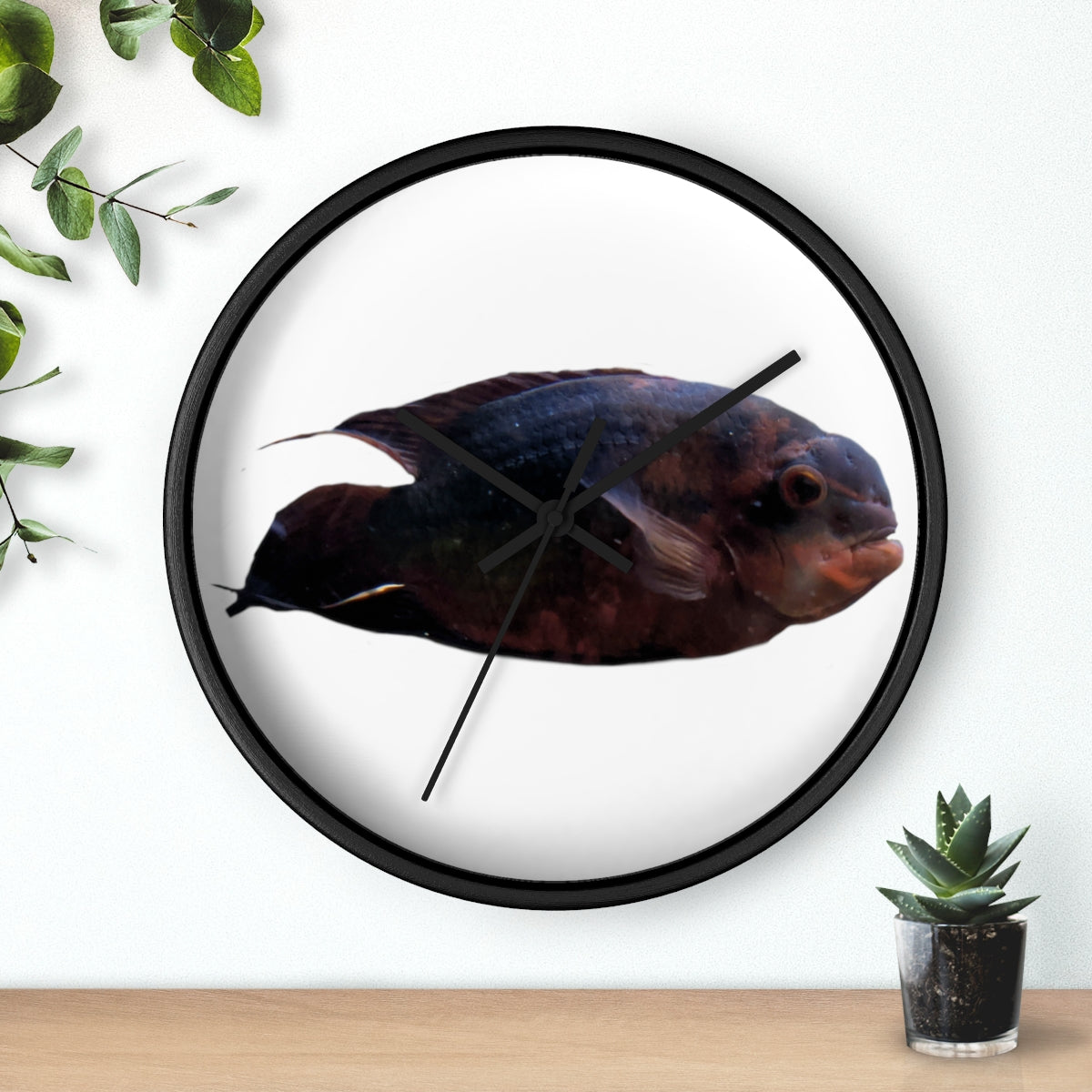 A stylish Red Black Fish Wall Clock featuring a wooden frame and a plexiglass face, perfect for indoor decor.