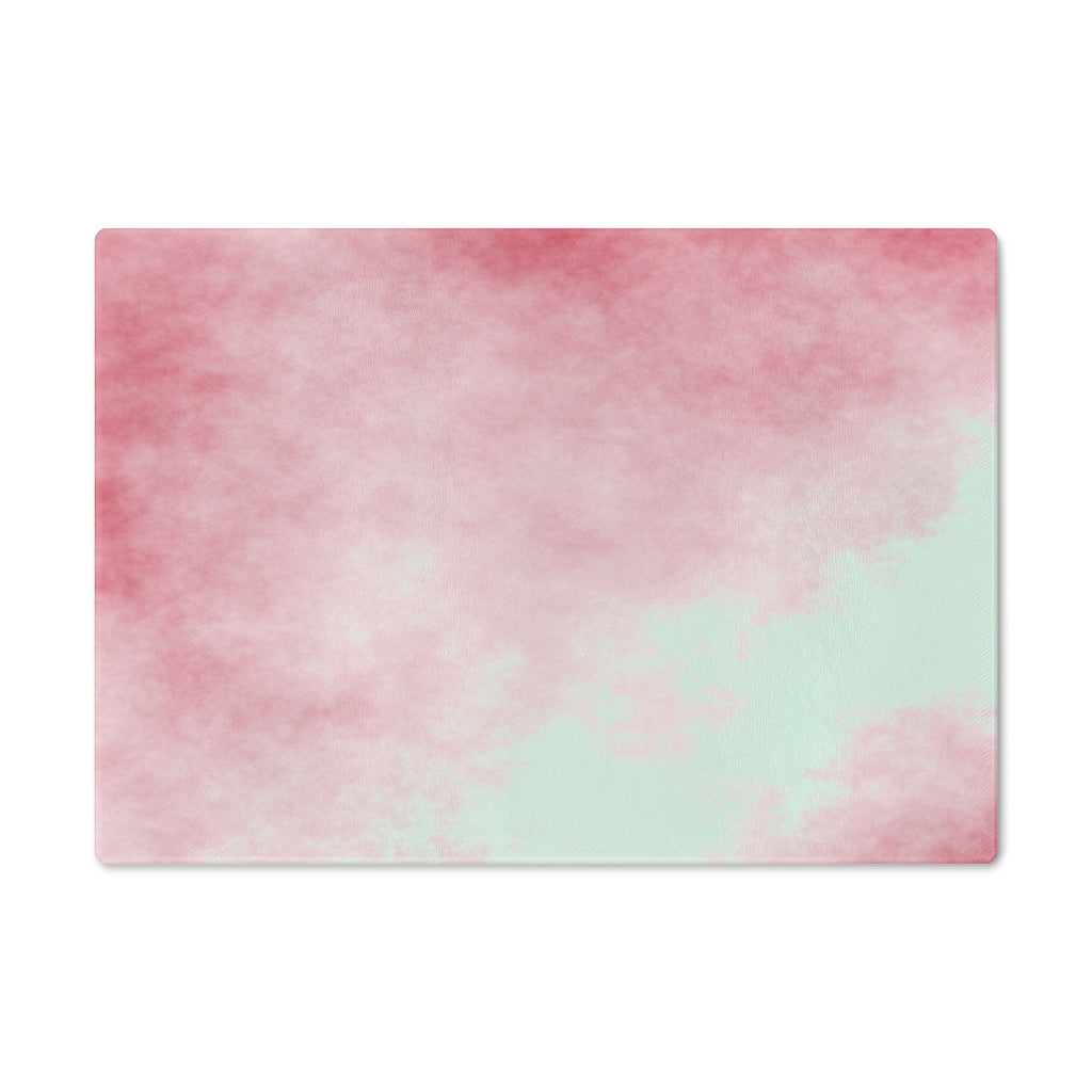 Red Clouds Cutting Board made of tempered glass with a vibrant red cloud design and rubber dots for stability.