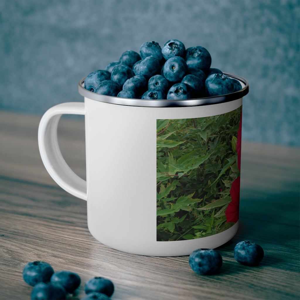 A durable red flowers enamel camping mug with a C-handle, perfect for outdoor adventures and stylish beverage enjoyment.