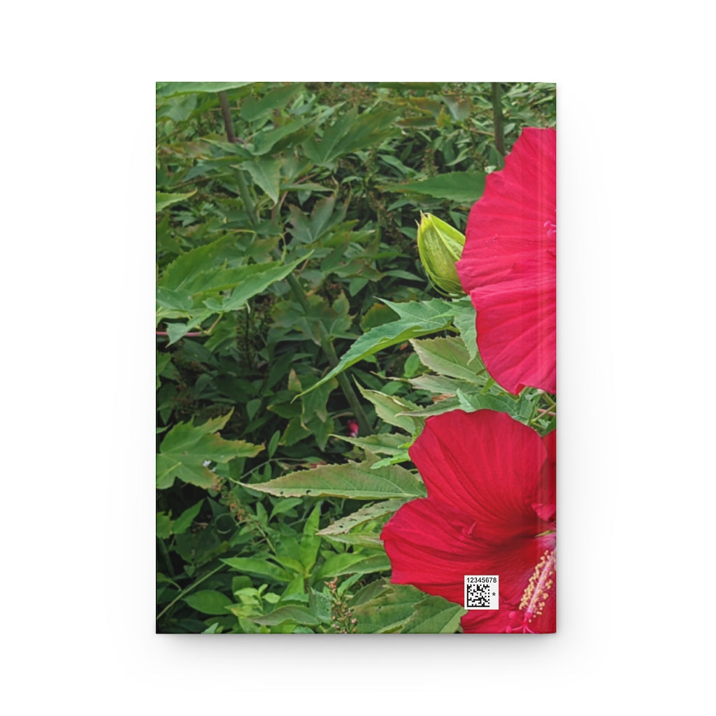 A beautifully designed Red Flowers Hardcover Journal with a matte finish, featuring vibrant floral patterns on the cover.