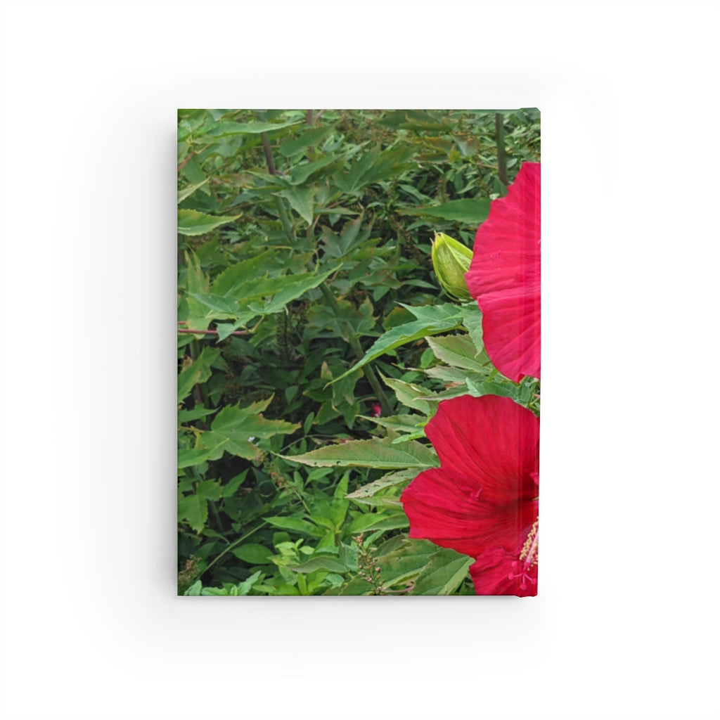 A hardcover journal featuring a vibrant red flowers design, showcasing its blank pages and durable casewrap binding.