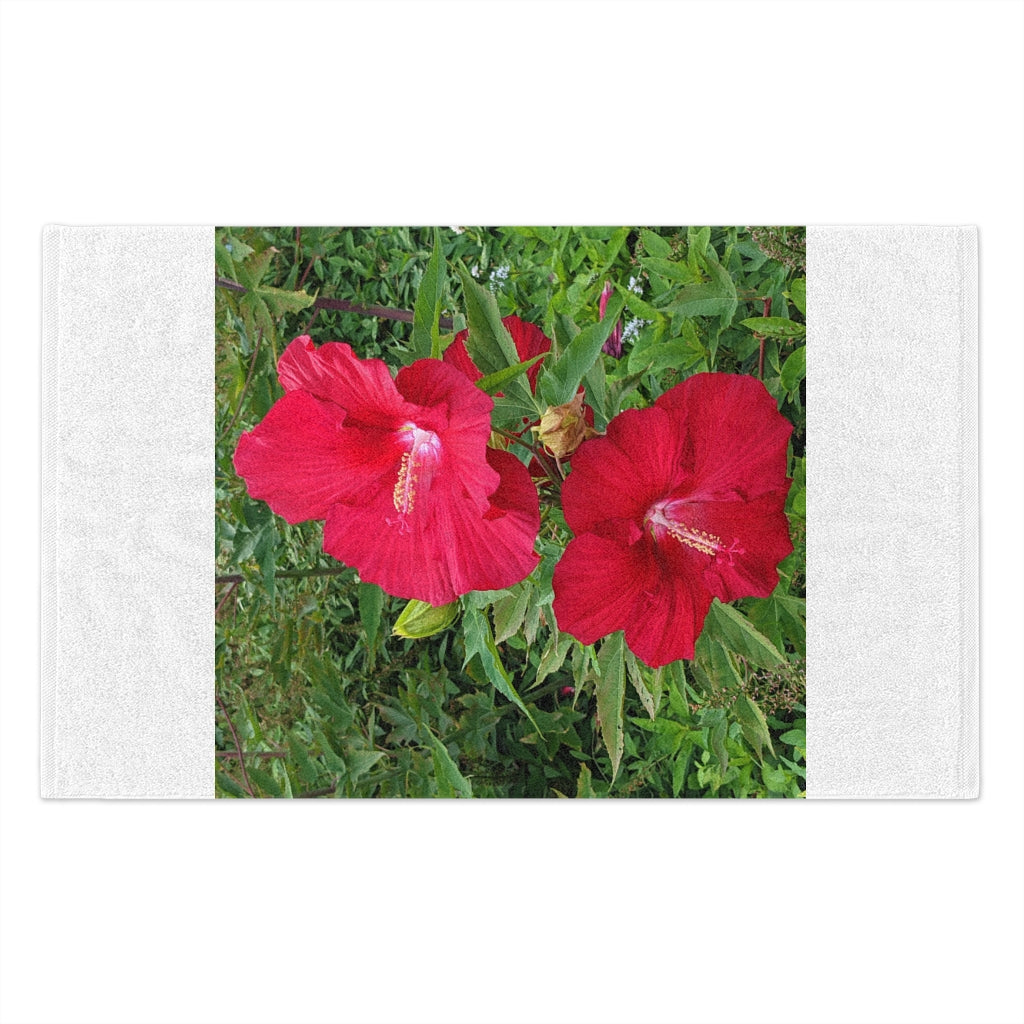 Red Flowers Rally Towel featuring a vibrant floral design, made from soft polyester and absorbent cotton.