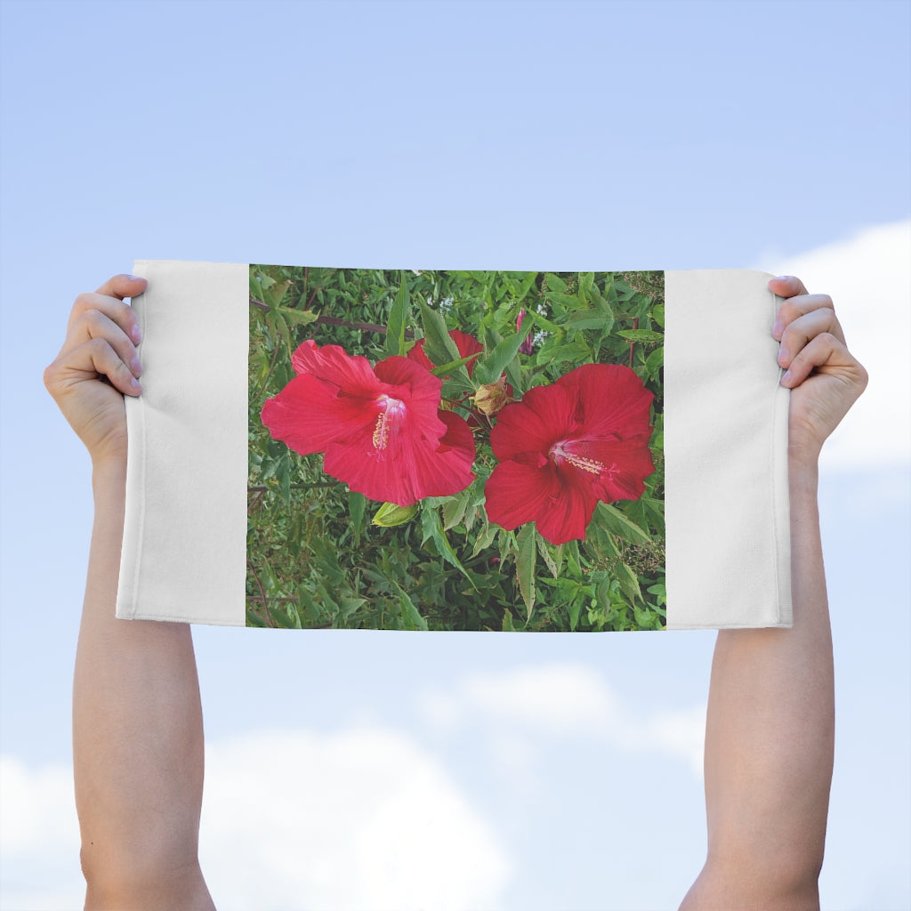 Red Flowers Rally Towel featuring a vibrant floral design, made from soft polyester and absorbent cotton.