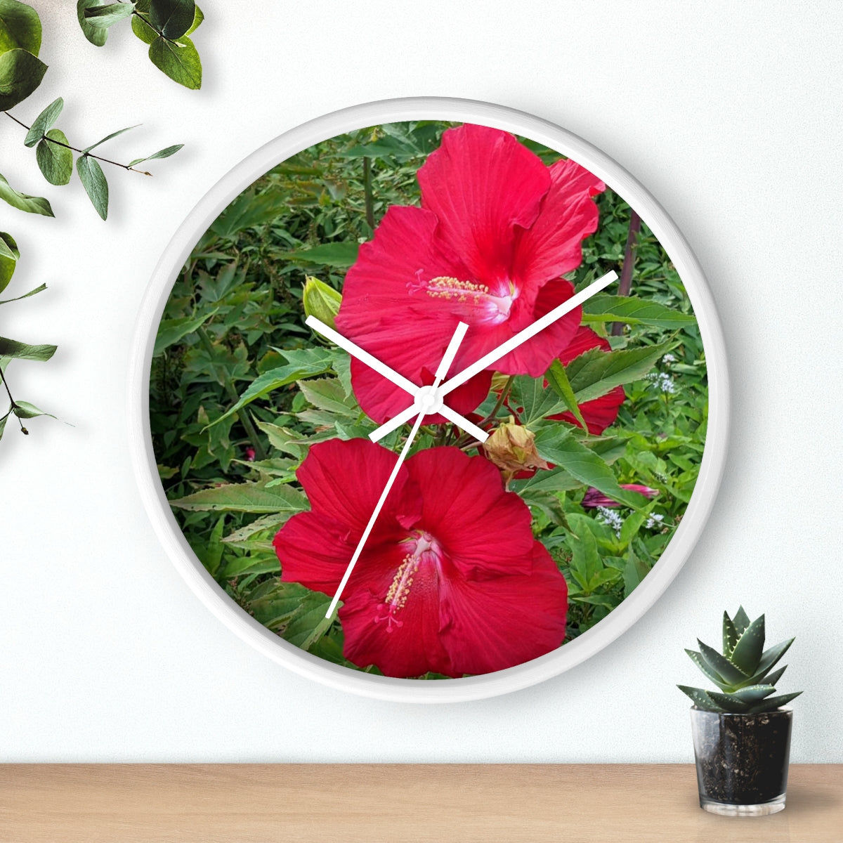 A vibrant Red Flowers Wall Clock featuring a wooden frame and a plexiglass face, perfect for indoor decor.