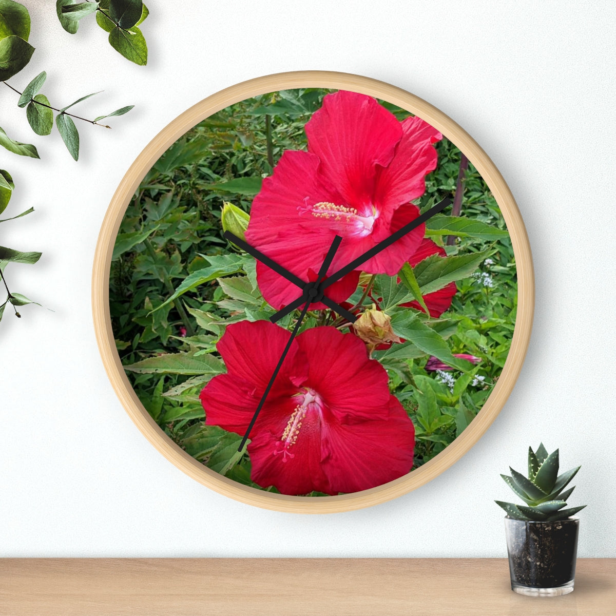 A vibrant Red Flowers Wall Clock featuring a wooden frame and a plexiglass face, perfect for indoor decor.