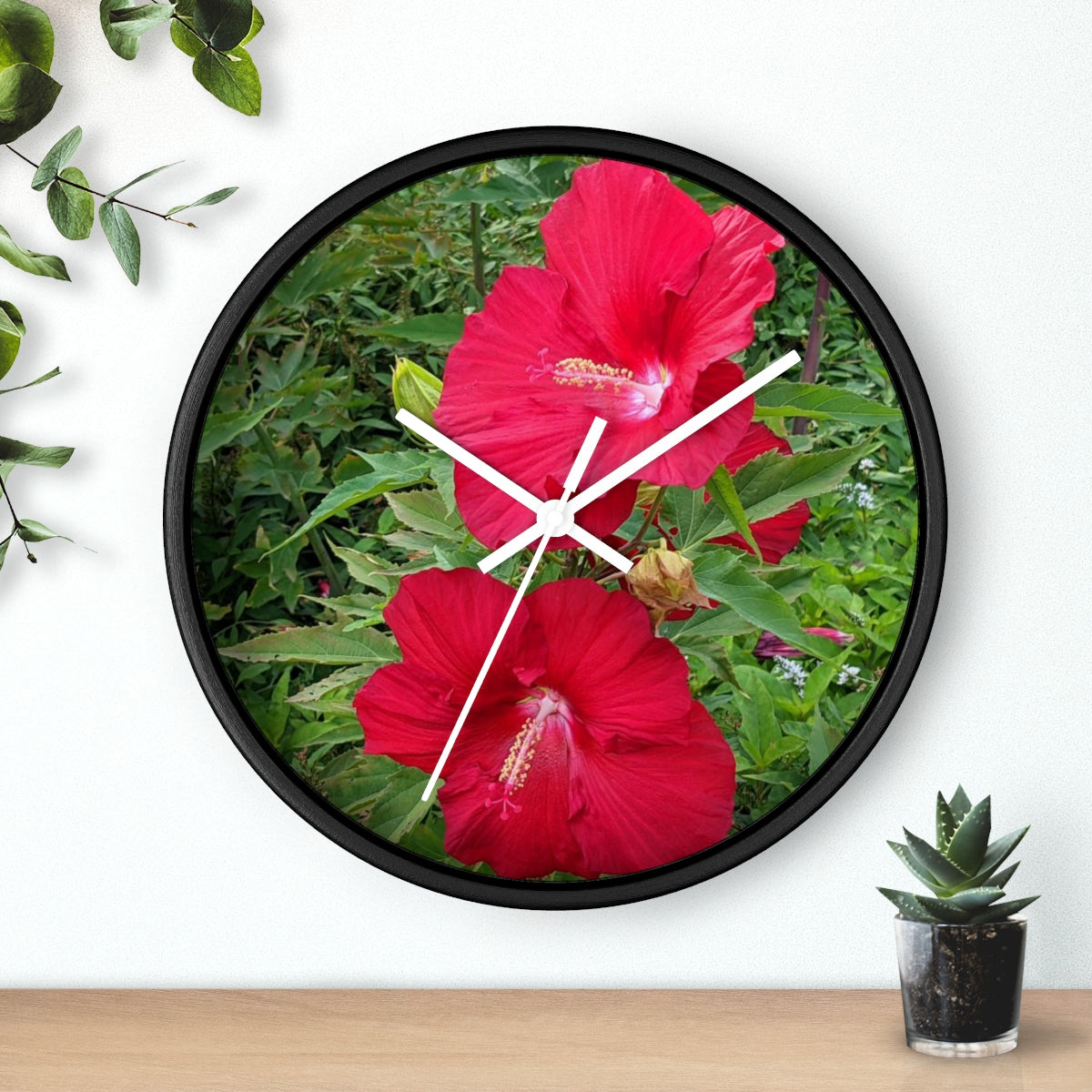 A vibrant Red Flowers Wall Clock featuring a wooden frame and a plexiglass face, perfect for indoor decor.