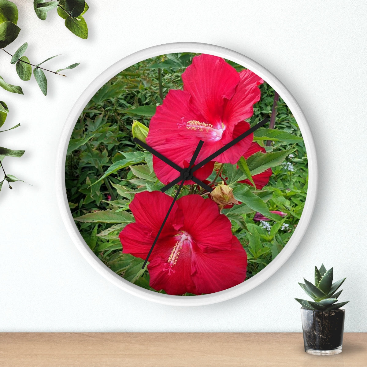 A vibrant Red Flowers Wall Clock featuring a wooden frame and a plexiglass face, perfect for indoor decor.