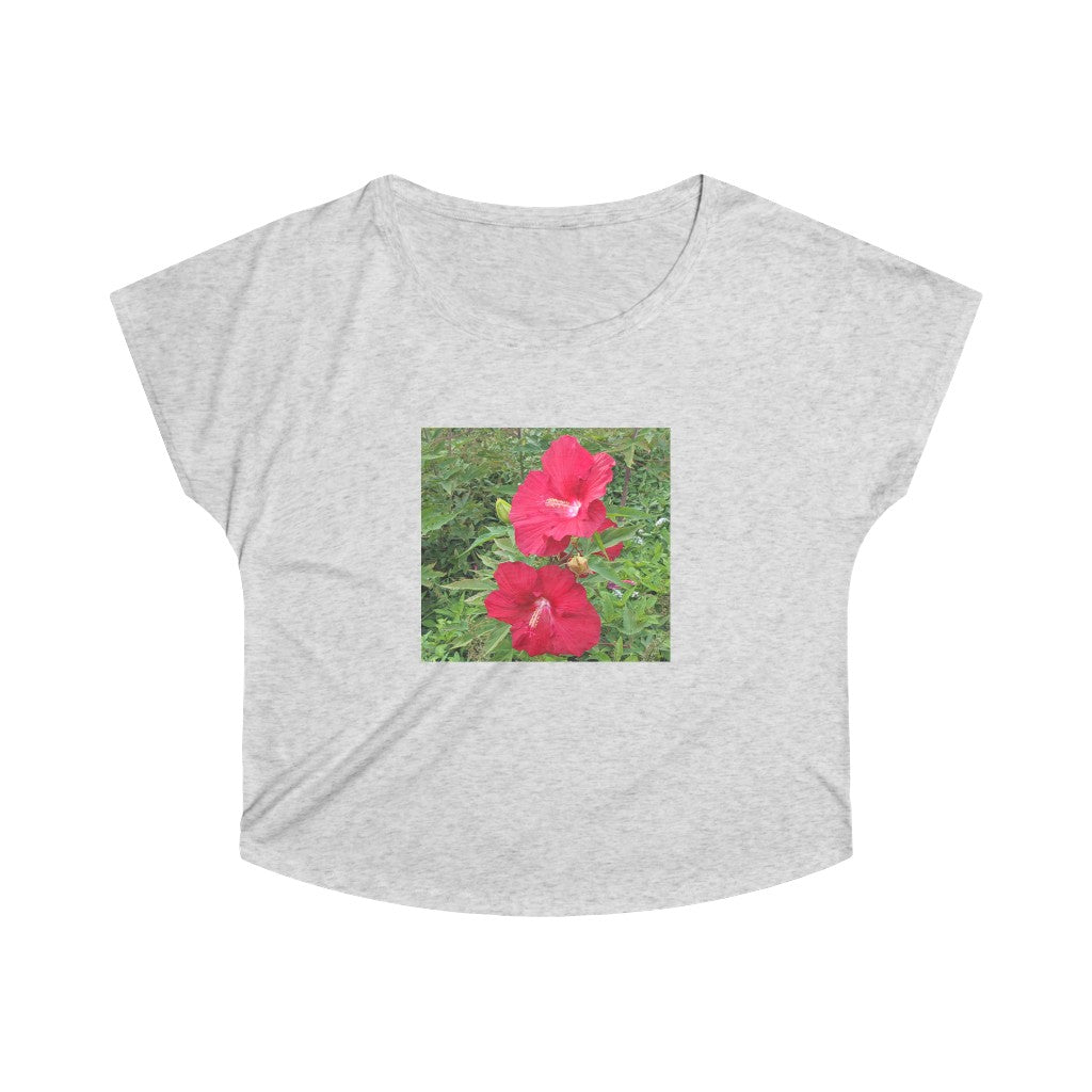 A stylish Red Flowers Women's Tri-Blend Dolman tee showcasing its loose fit and soft fabric, perfect for casual wear.