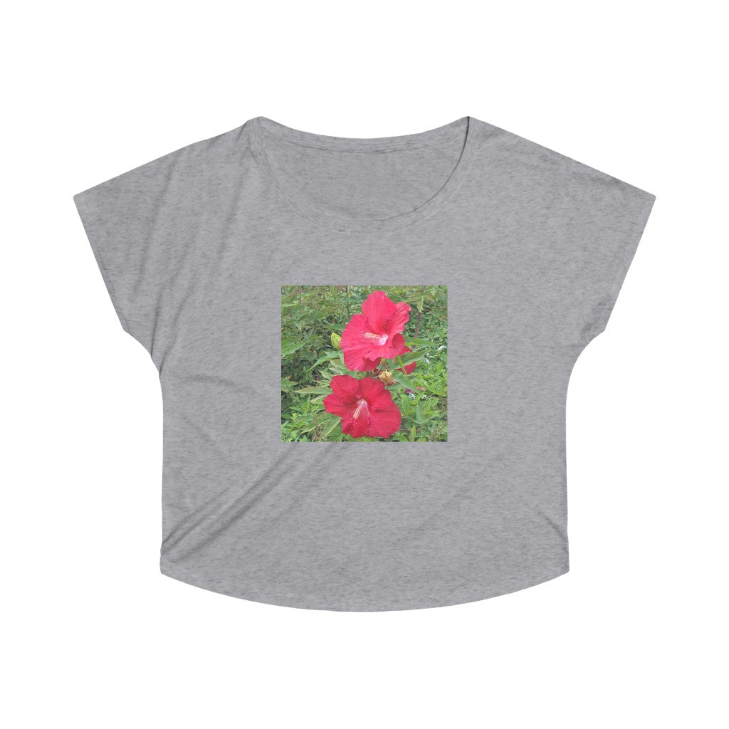 A stylish Red Flowers Women's Tri-Blend Dolman tee showcasing its loose fit and soft fabric, perfect for casual wear.