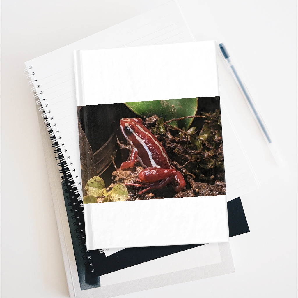 Red Frog Journal with ruled lines, featuring a durable hardcover and vibrant wraparound print.