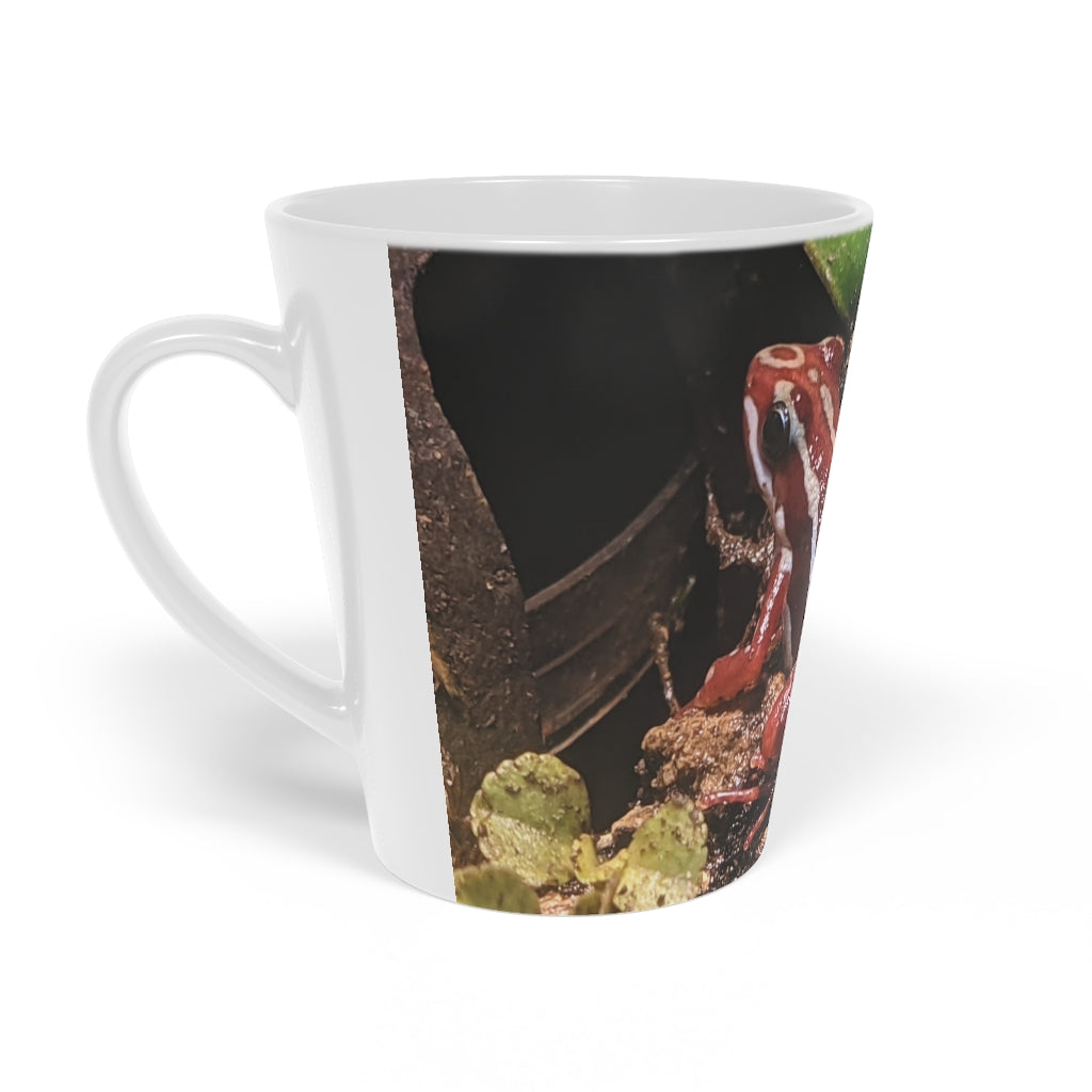 A stylish Red Frog Latte Mug, 12oz, made of durable white ceramic with a scratch-resistant finish and an easy-grip handle.