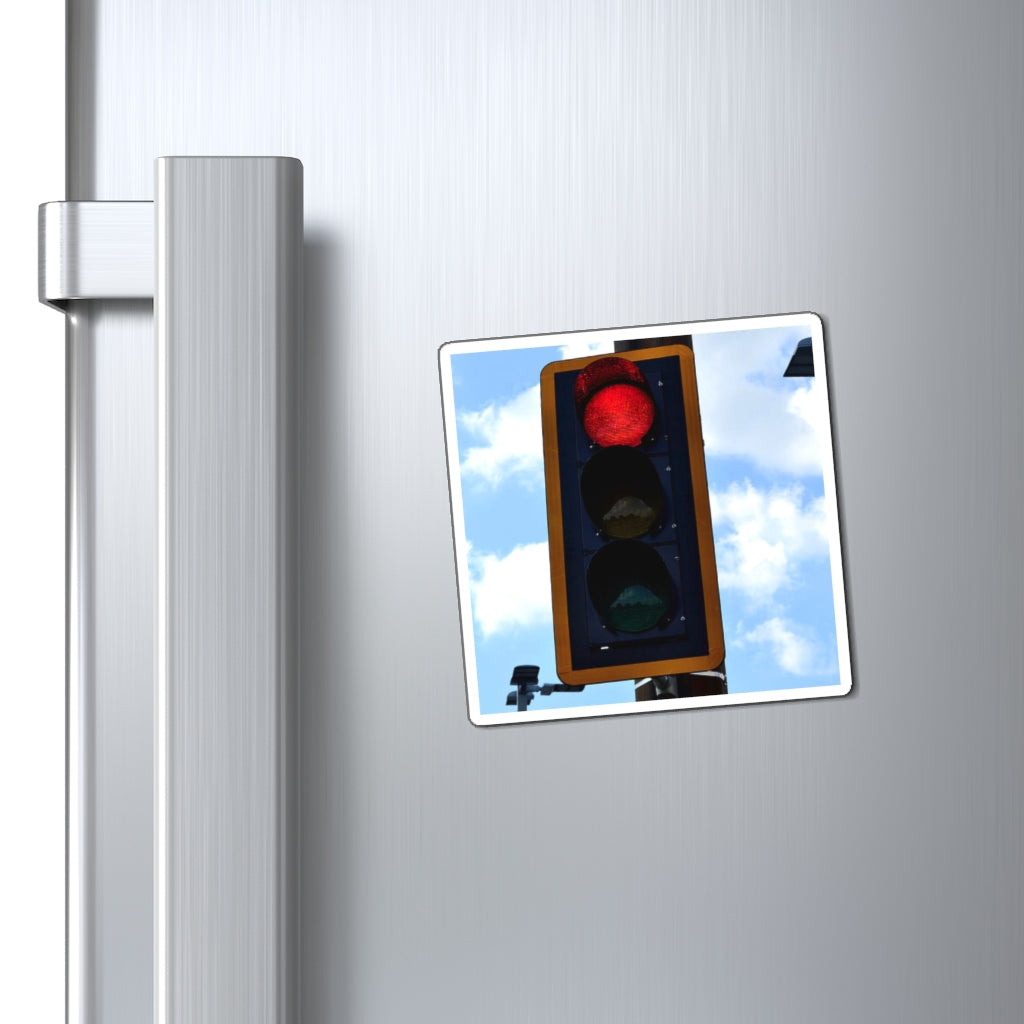 A set of Red Light Magnets showcasing various sizes and a bold black backing, ideal for displaying messages on metallic surfaces.