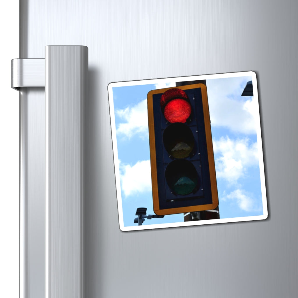 A set of Red Light Magnets showcasing various sizes and a bold black backing, ideal for displaying messages on metallic surfaces.