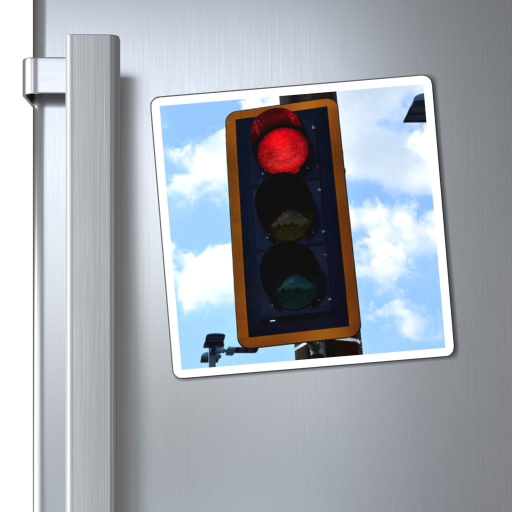 A set of Red Light Magnets showcasing various sizes and a bold black backing, ideal for displaying messages on metallic surfaces.