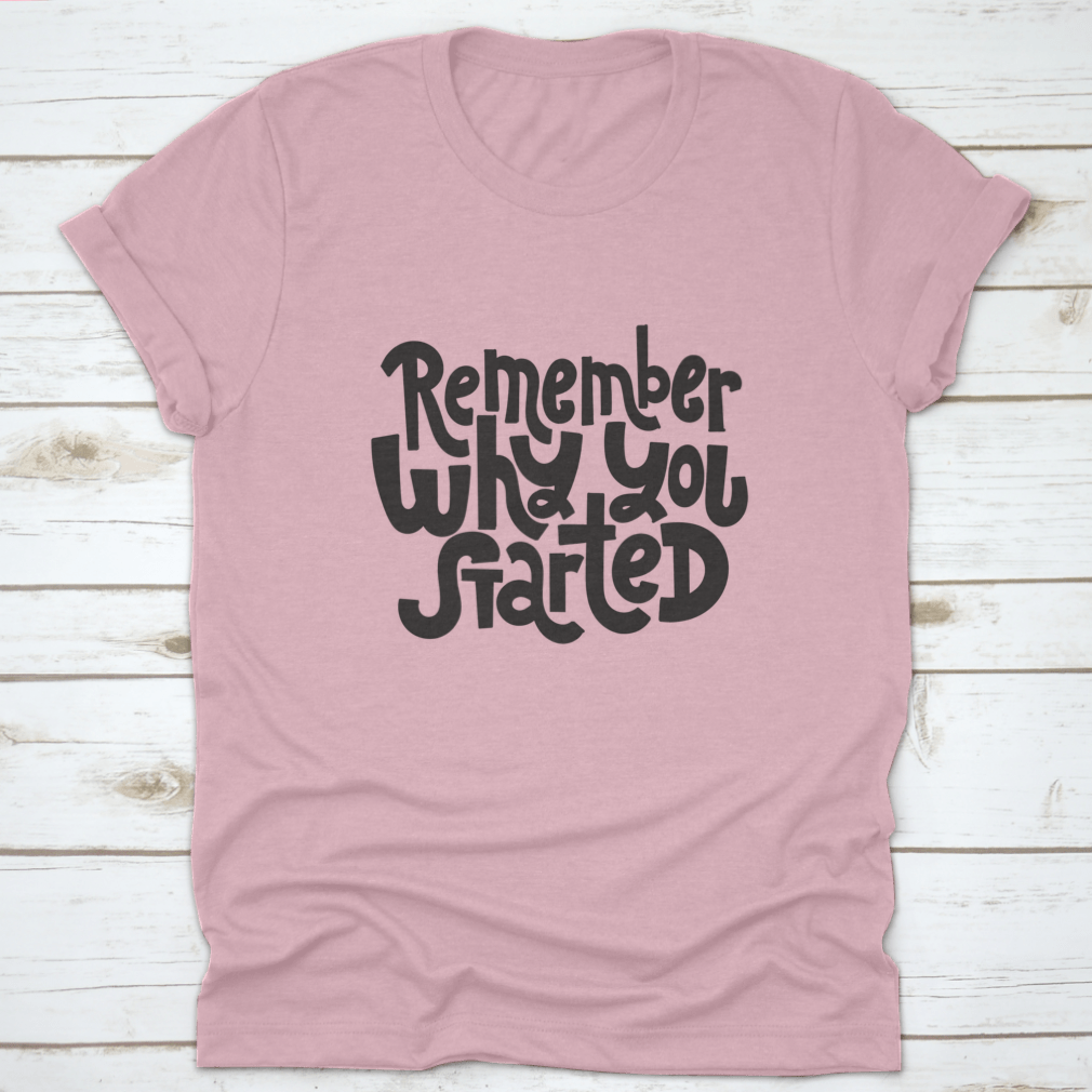 A comfortable and stylish t-shirt featuring the motivational quote 'Remember Why You Started', made from 100% cotton with a classic fit.