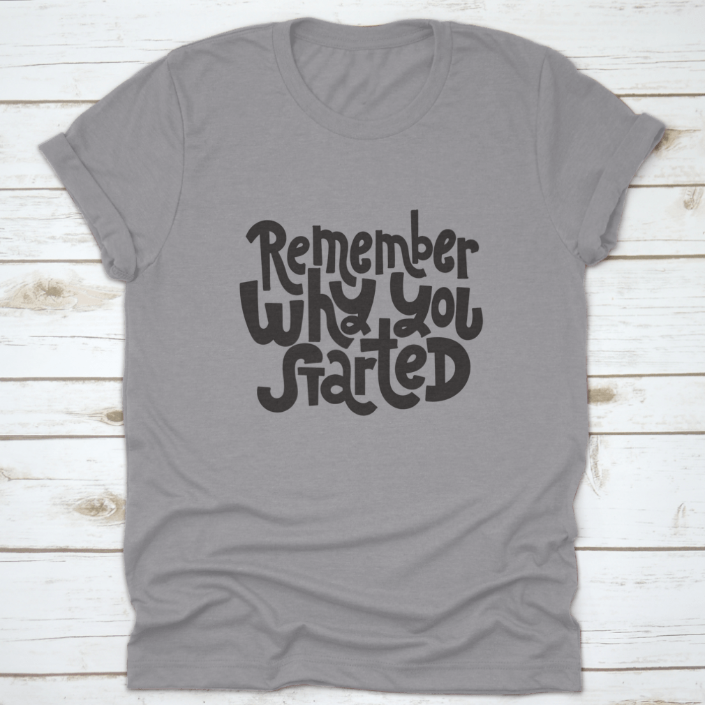 A comfortable and stylish t-shirt featuring the motivational quote 'Remember Why You Started', made from 100% cotton with a classic fit.