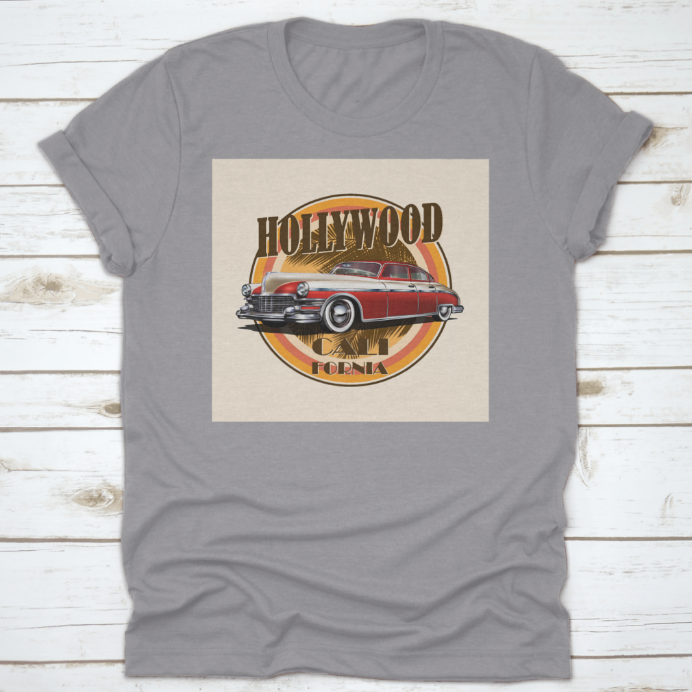 Retro car t-shirt featuring Hollywood typography with palm trees background, showcasing vibrant colors and stylish design.