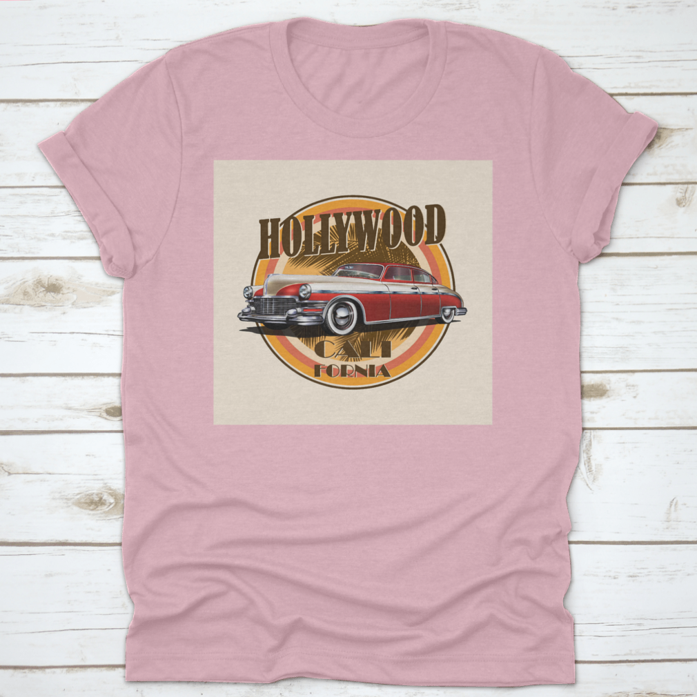 Retro car t-shirt featuring Hollywood typography with palm trees background, showcasing vibrant colors and stylish design.