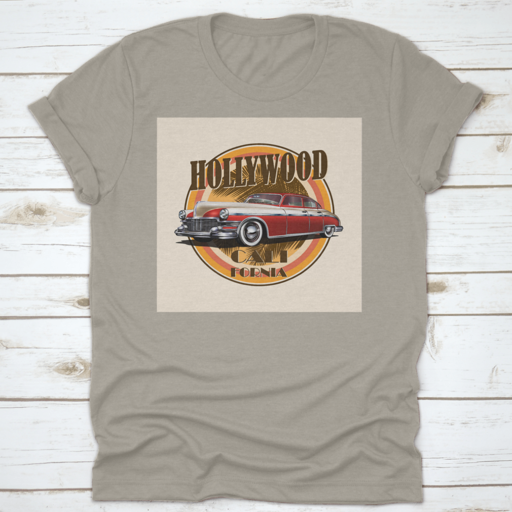 Retro car t-shirt featuring Hollywood typography with palm trees background, showcasing vibrant colors and stylish design.