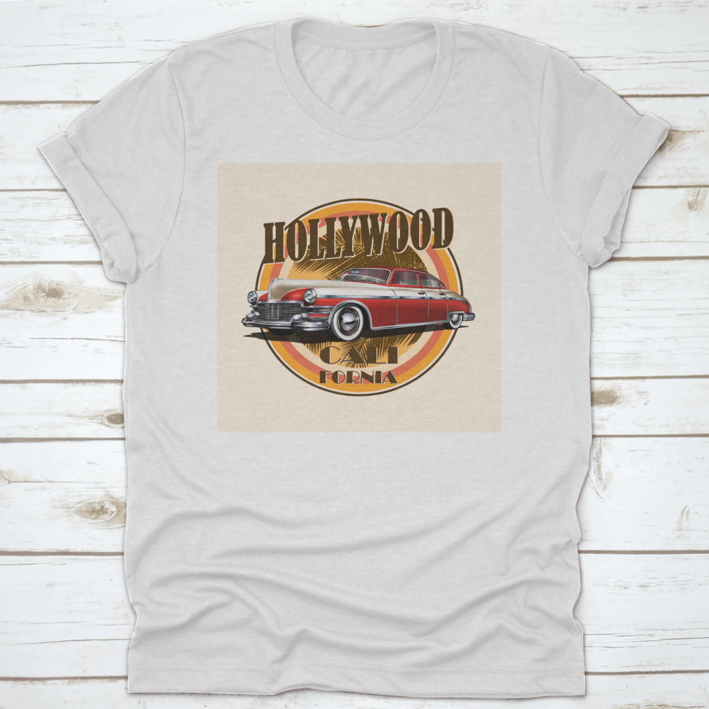 Retro car t-shirt featuring Hollywood typography with palm trees background, showcasing vibrant colors and stylish design.