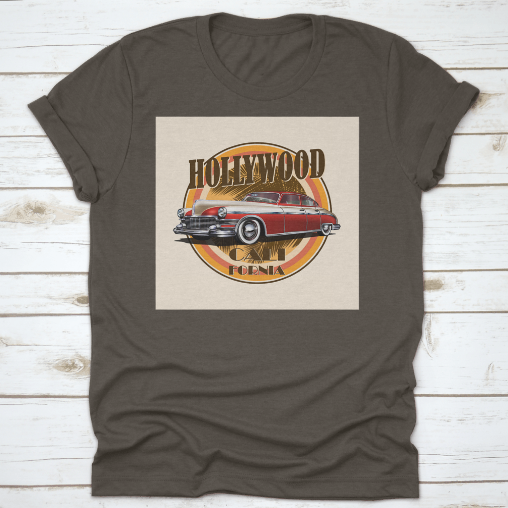 Retro car t-shirt featuring Hollywood typography with palm trees background, showcasing vibrant colors and stylish design.