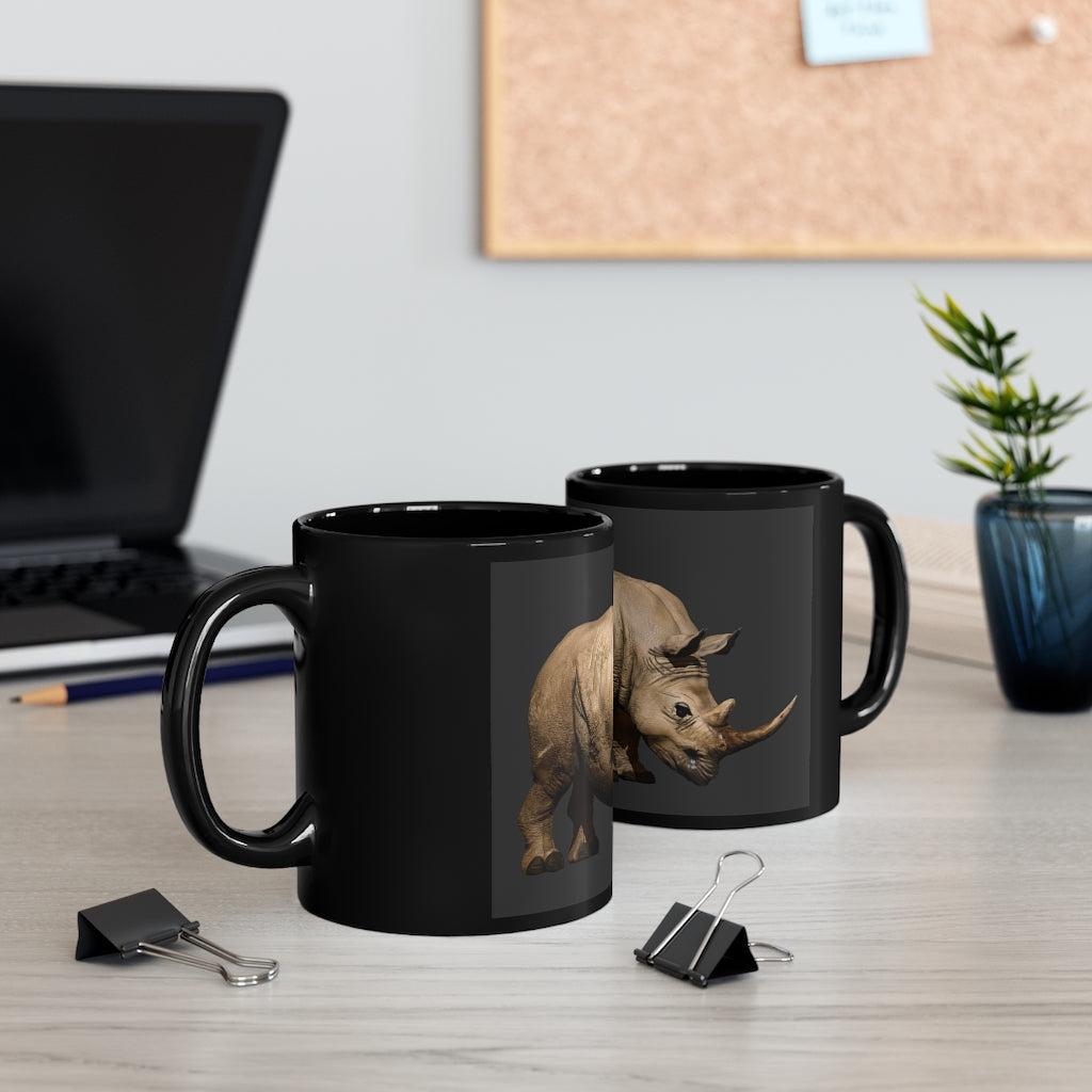 Rhino Black mug 11oz, featuring a sleek black ceramic design with rounded corners and a comfortable C-handle.