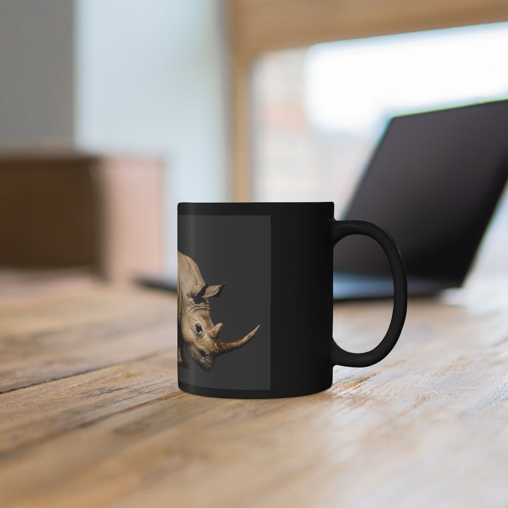 Rhino Black mug 11oz, featuring a sleek black ceramic design with rounded corners and a comfortable C-handle.