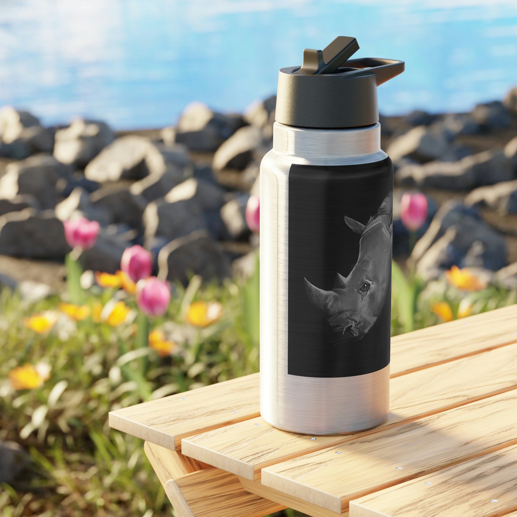 Rhino Gator Tumbler in stainless steel with a plastic straw, showcasing a customizable design.