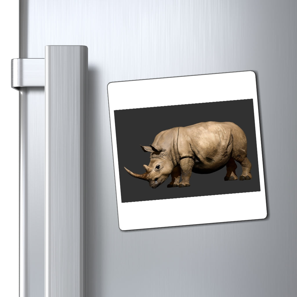 A collection of Rhino Magnets showcasing various sizes and a sleek black backing, ideal for displaying messages on metallic surfaces.