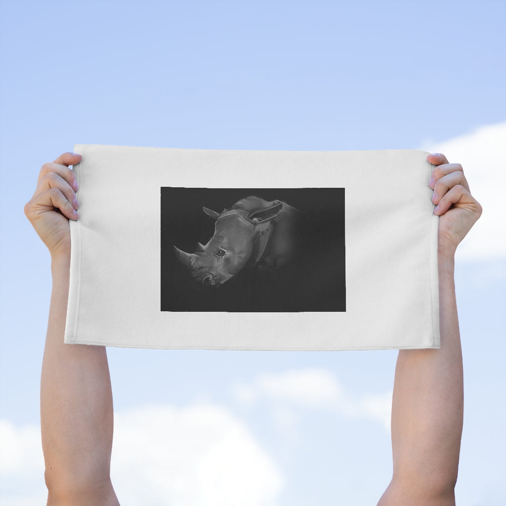 Rhino Rally Towel measuring 11x18 inches, featuring a soft polyester front and absorbent cotton backing, perfect for sports and beach use.