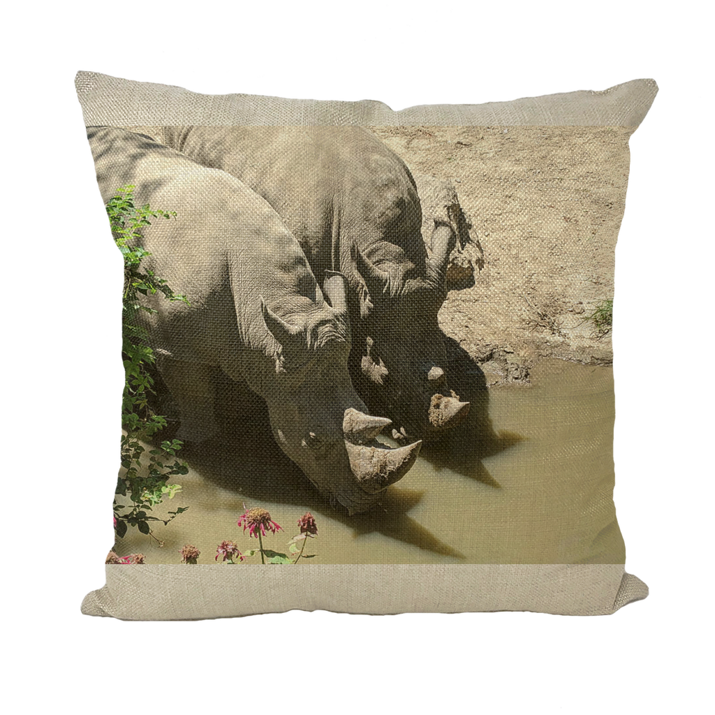 Rhino Throw Pillows in various styles including linen, canvas, and suede, showcasing their vibrant colors and textures.