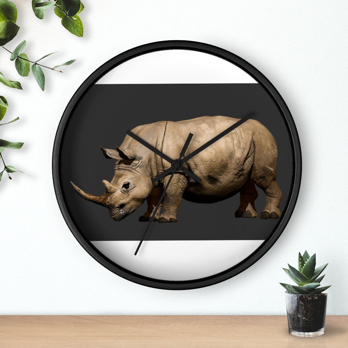 Rhino Wall Clock featuring a wooden frame and plexiglass face, showcasing a unique rhino design.