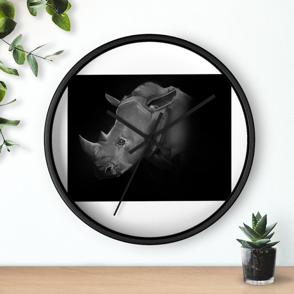 A stylish Rhino Wall Clock featuring a wooden frame and plexiglass face, showcasing a unique rhino design.