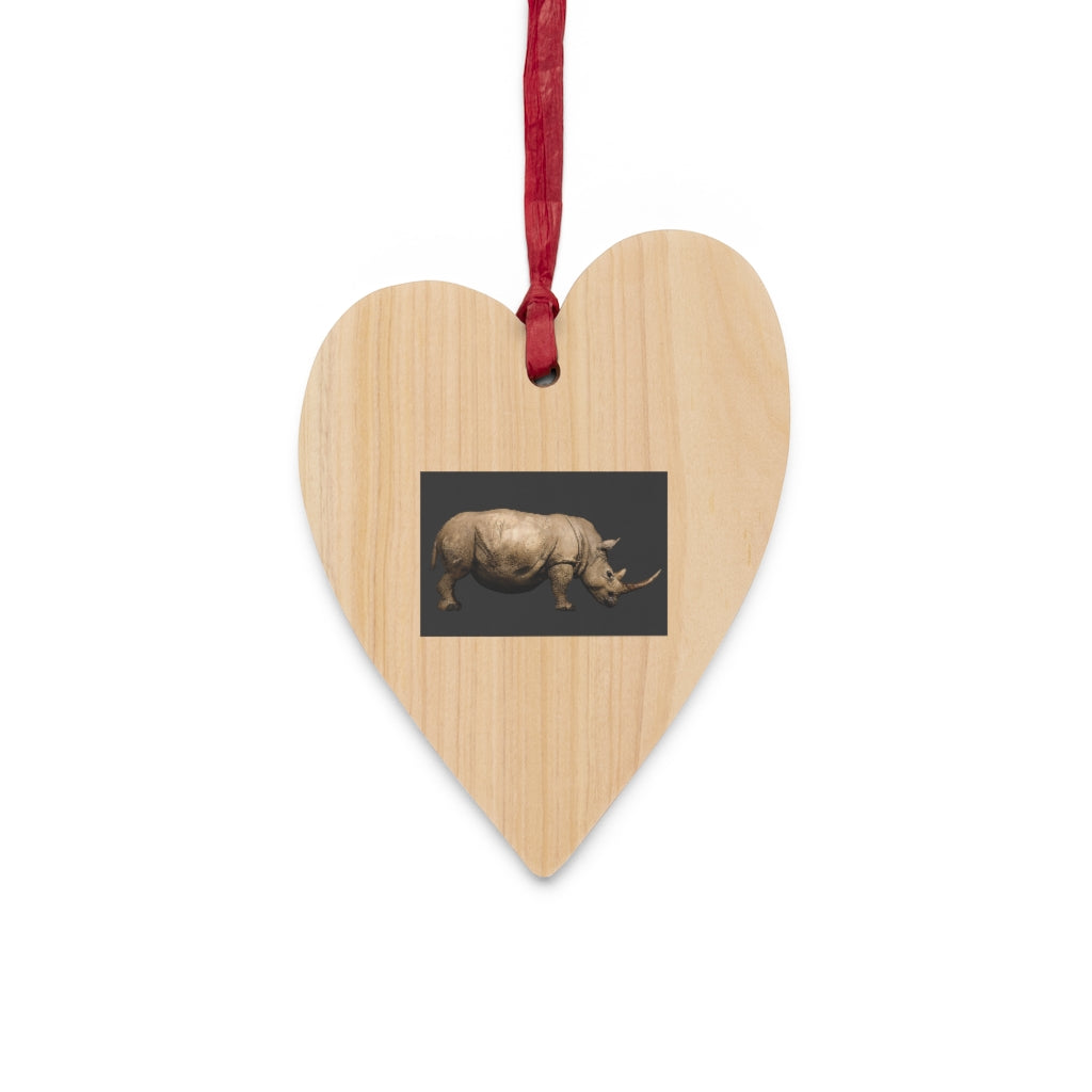 A collection of Rhino Wooden Christmas Ornaments in various whimsical shapes, featuring a rustic wood finish and red ribbons for hanging.