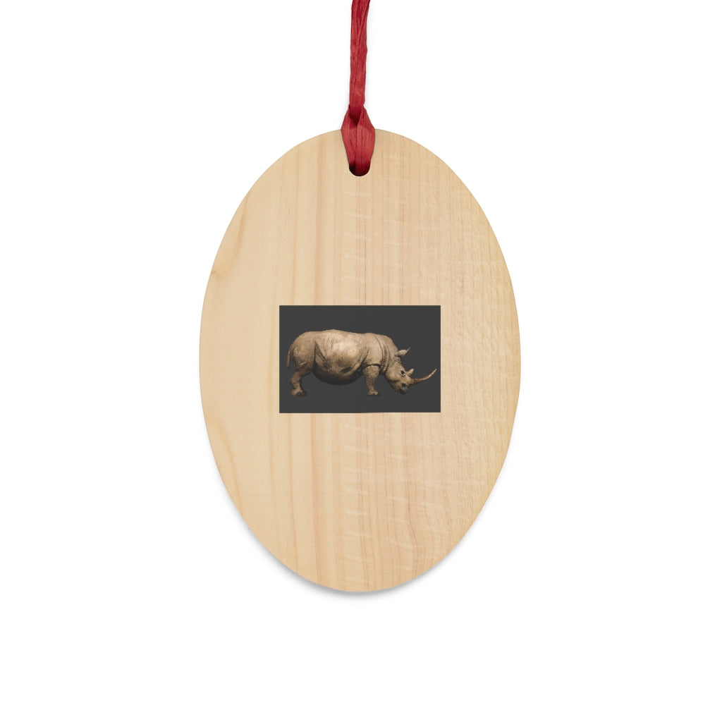 A collection of Rhino Wooden Christmas Ornaments in various whimsical shapes, featuring a rustic wood finish and red ribbons for hanging.