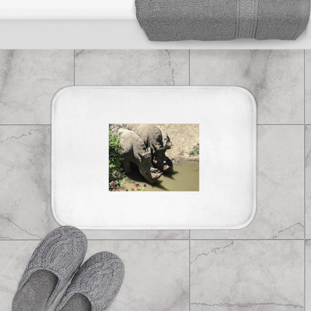 Rhinos Bath Mat featuring a stylish design with anti-slip backing, made from soft microfiber material.