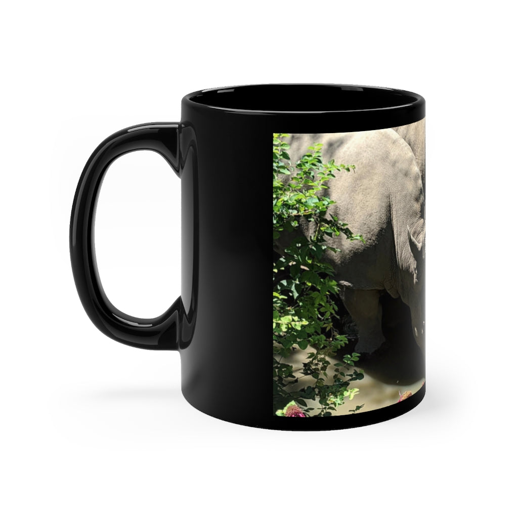 Rhinos Black mug 11oz showcasing a sleek black ceramic design with rounded corners and a comfortable C-handle.