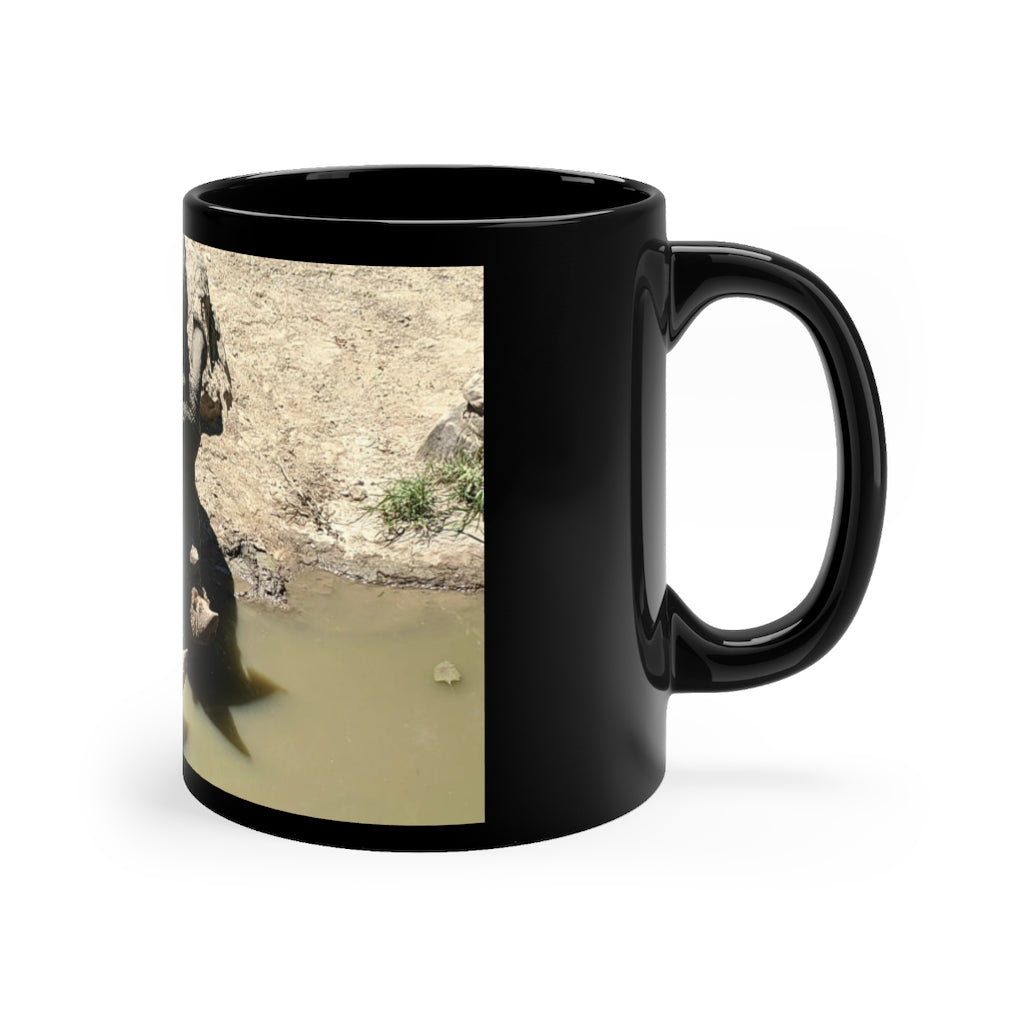 Rhinos Black mug 11oz showcasing a sleek black ceramic design with rounded corners and a comfortable C-handle.