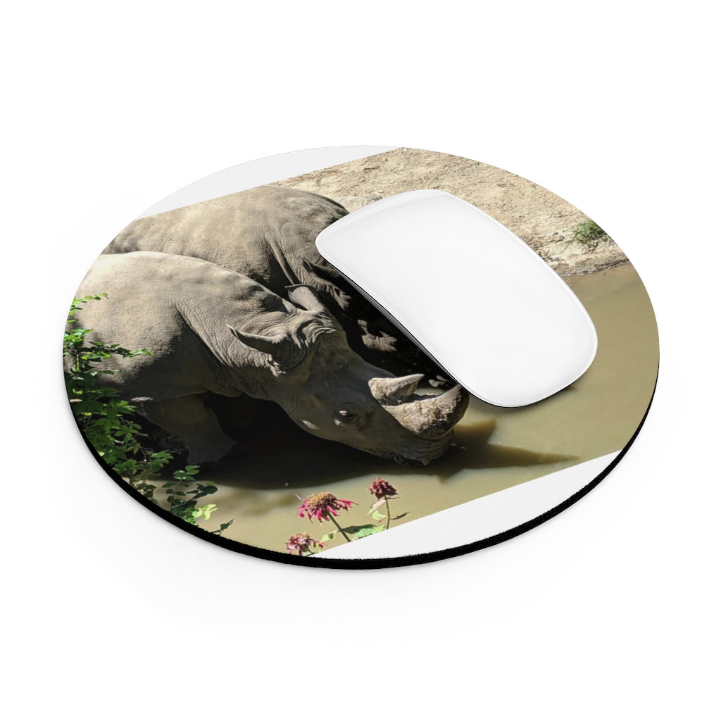 Rhinos Mouse Pad in round and rectangular shapes with vibrant print and non-slip rubber bottom.