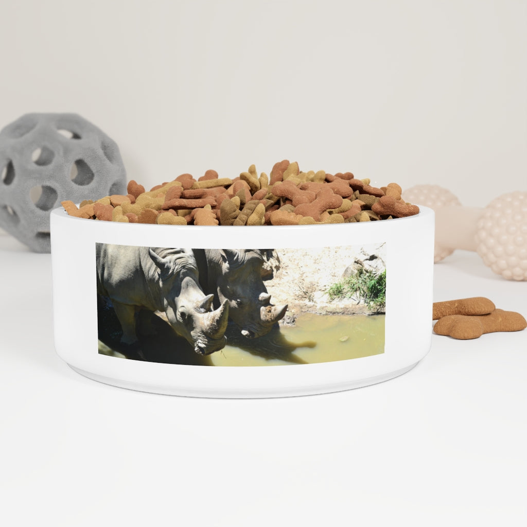 A stylish Rhinos Pet Bowl made of white ceramic, featuring a customizable design and a glazed finish, perfect for feeding pets.