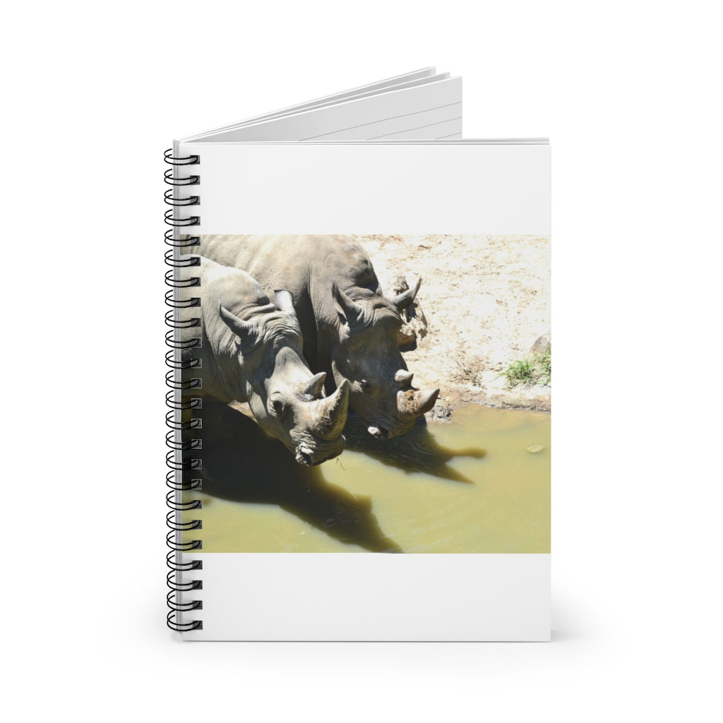 Rhinos Spiral Notebook featuring a colorful printed cover and ruled line pages, perfect for notes and lists.